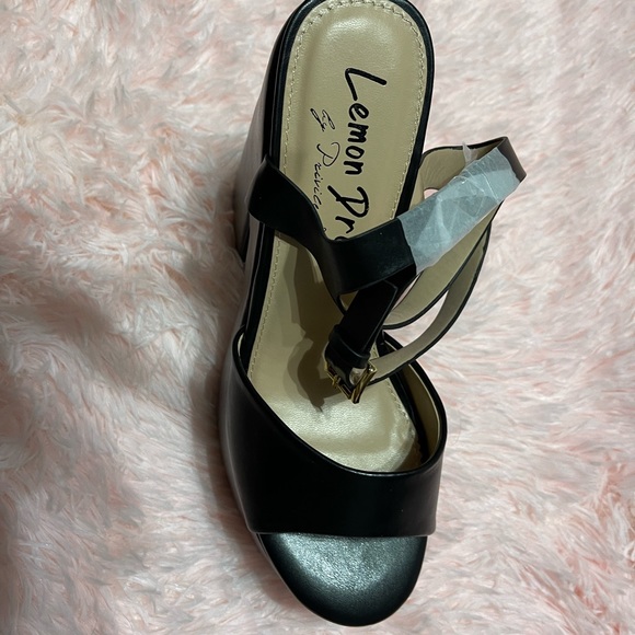 Lemon Drop by Privileged
Black Taga Platform Heels
Size 6.5 - Picture 6 of 8